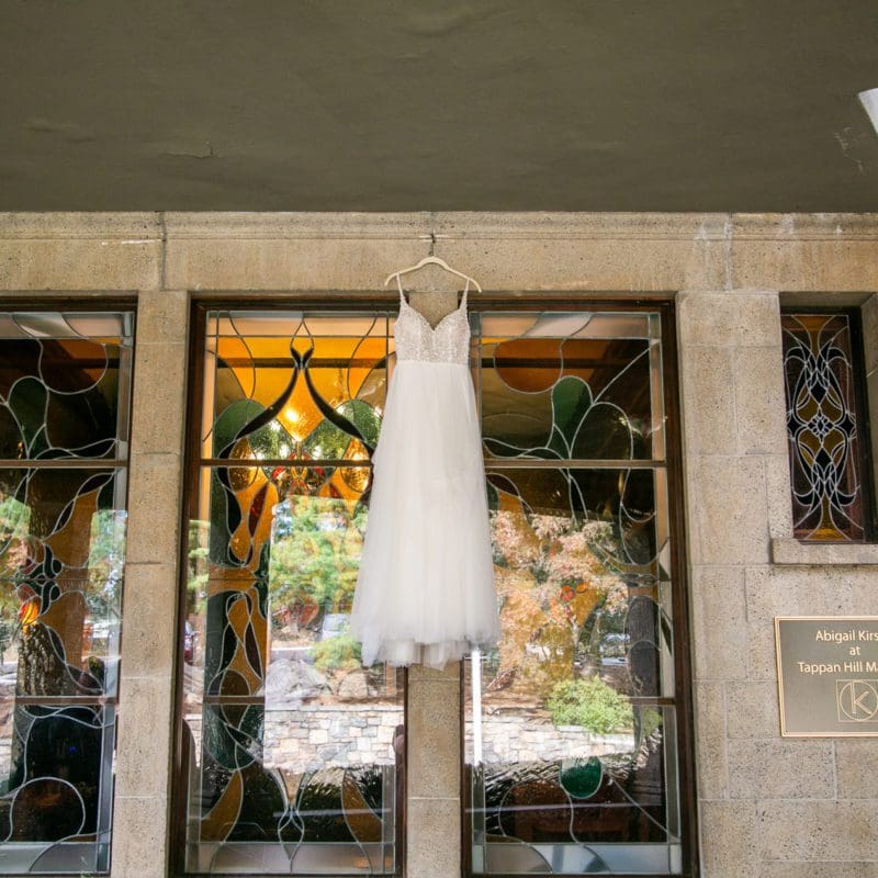 wedding dress hanging up