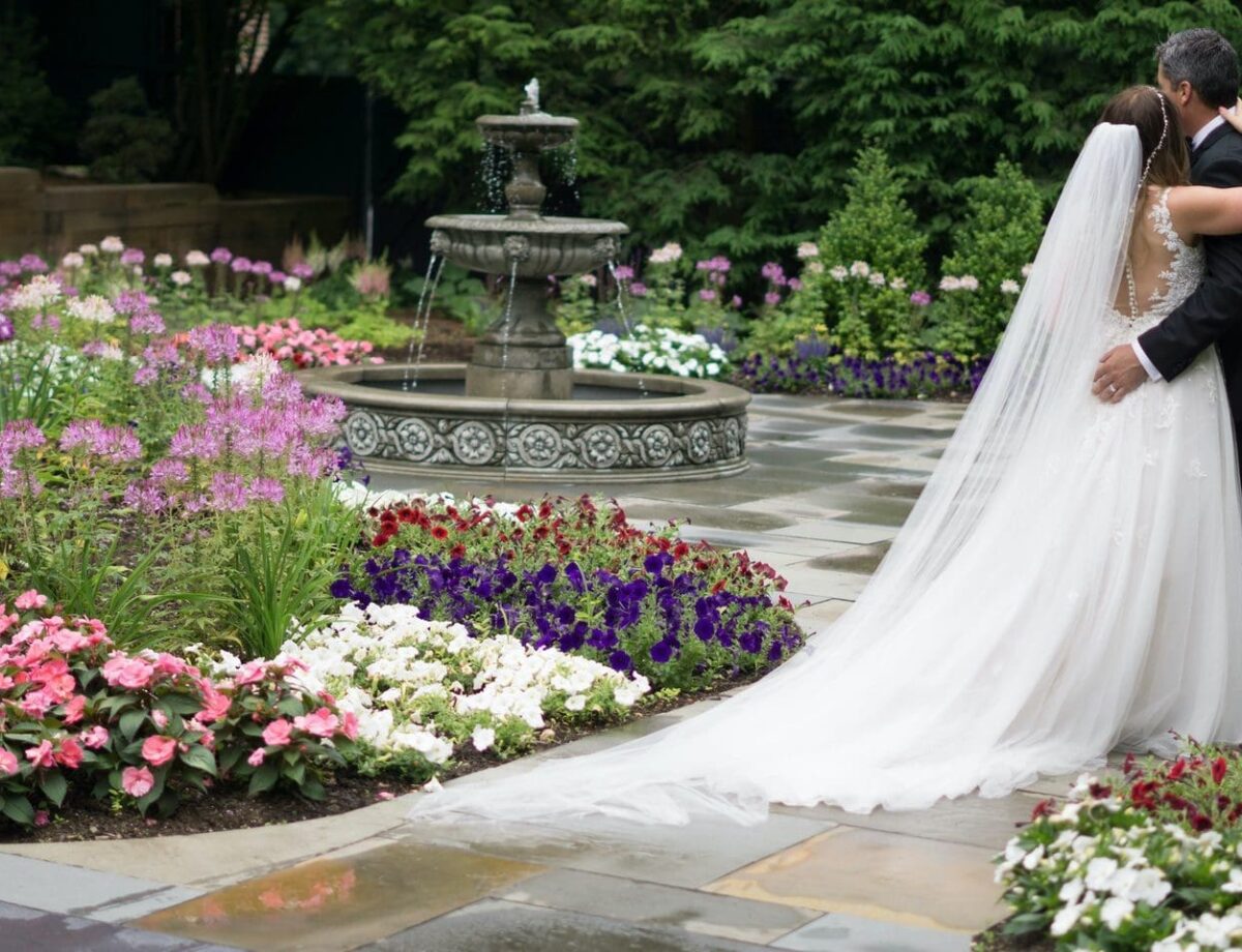 bride and groom outside embracing