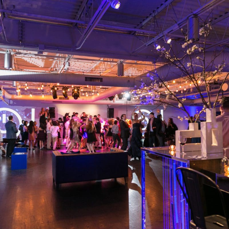 interior venue area with people dancing