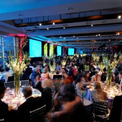 people eating in a fine dining area at tables