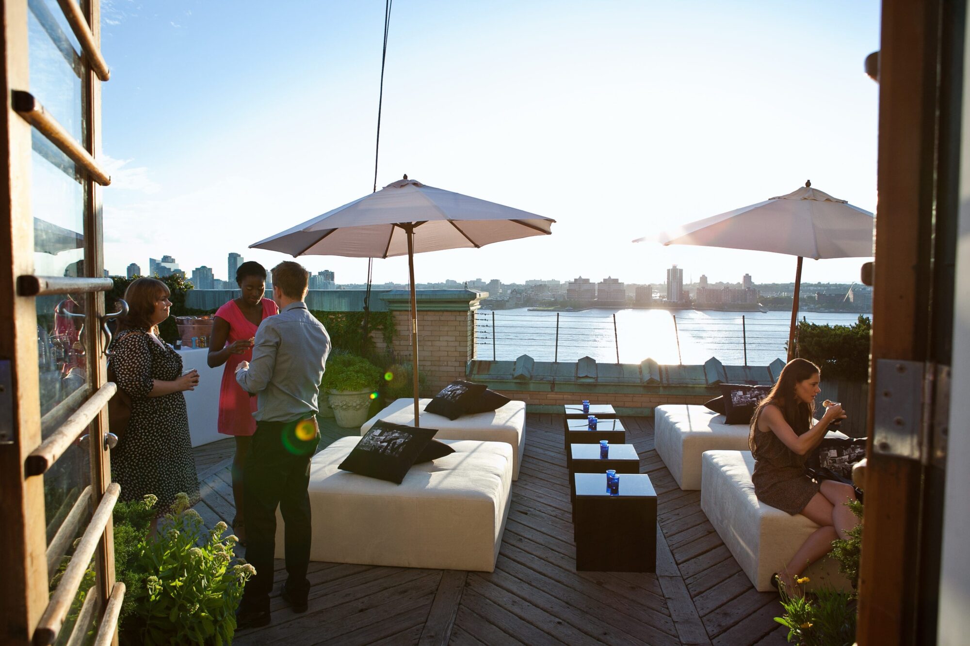 rooftop lounge area with waterfront view