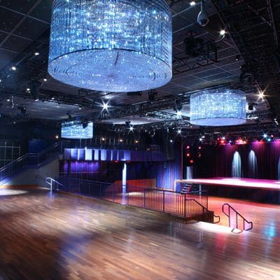 large interior venue with round chandeliers