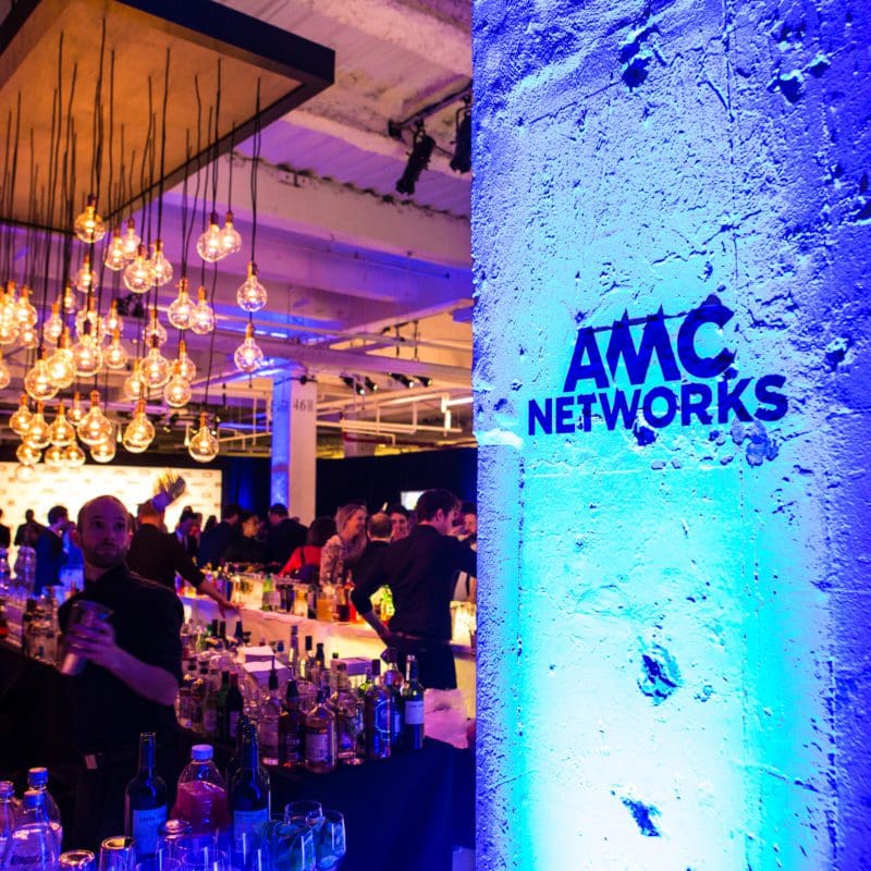 bartender mixing drinks at an AMC networks event