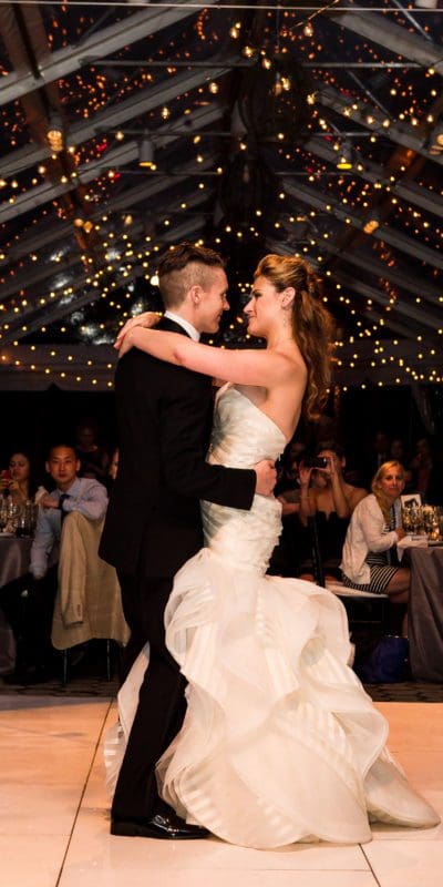 bride and groom embracing on the dance floor