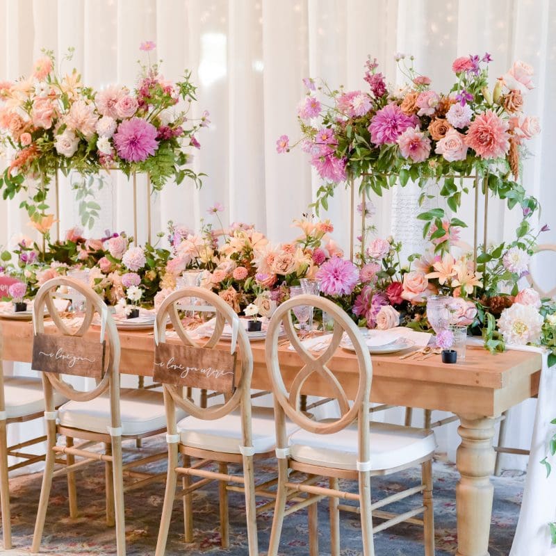 A table with a bouquet of flowers