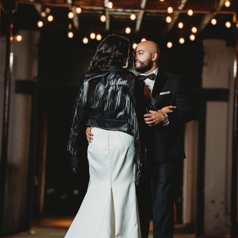 Bride and groom at night at the Loading Dock