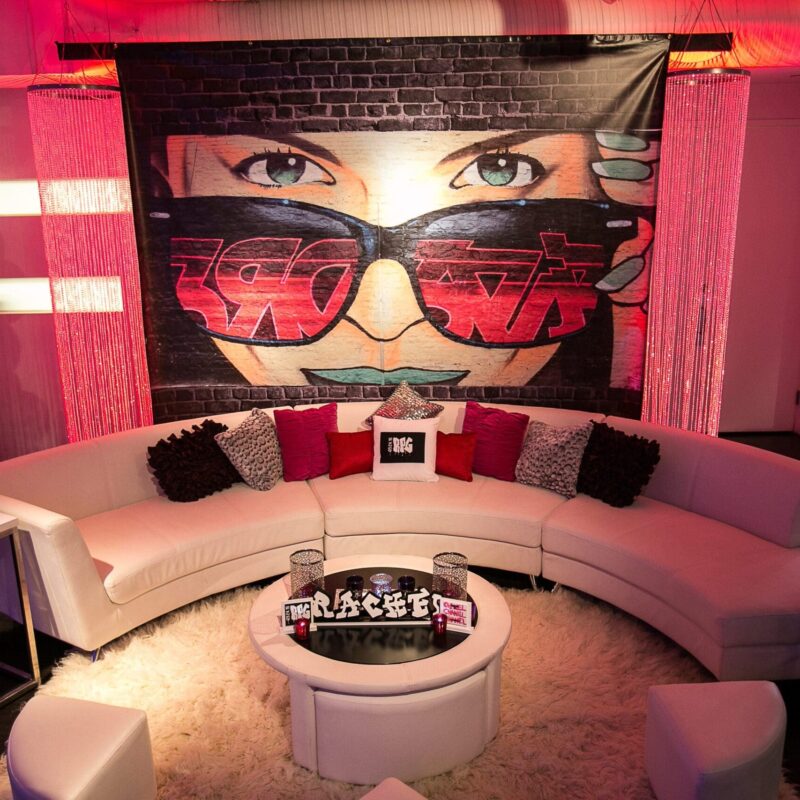 beautiful event space with low lighting and a lounge area