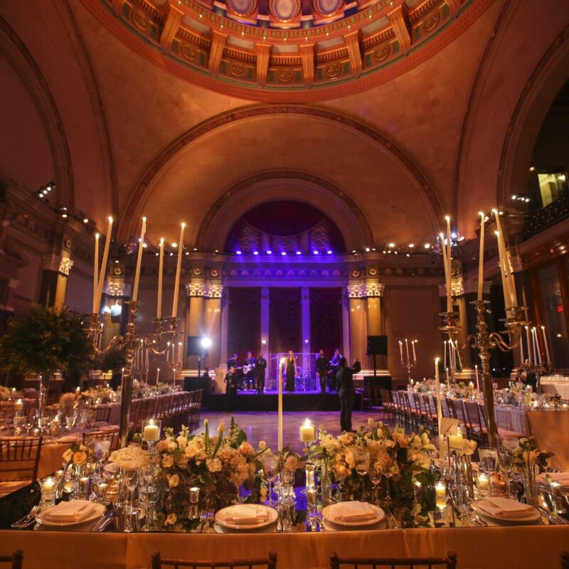 dramatic wedding table set up with candles at Weylin