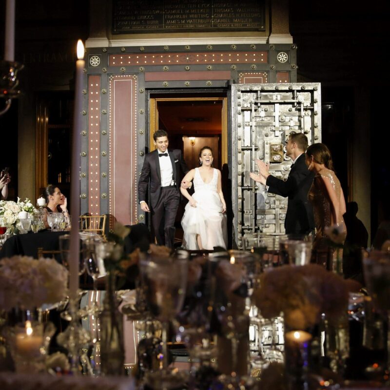 bride and groom entering room