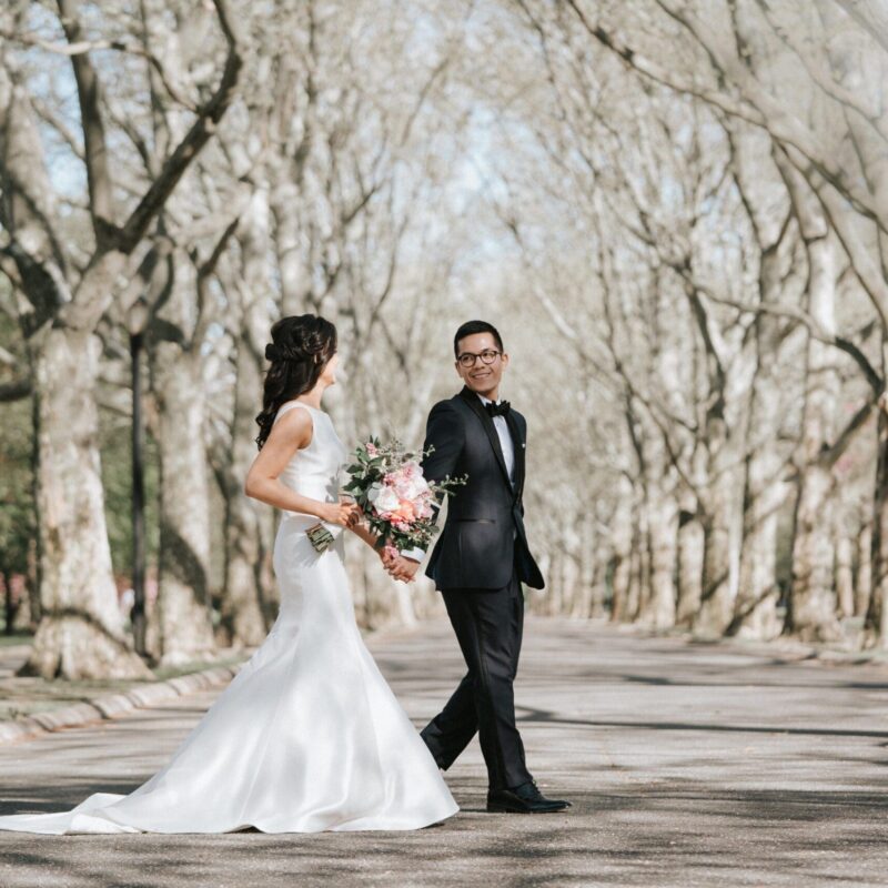 bride and groom walking outside