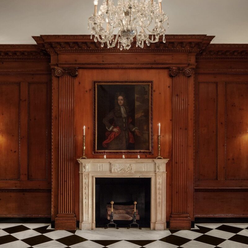 fireplace with picture over the mantel