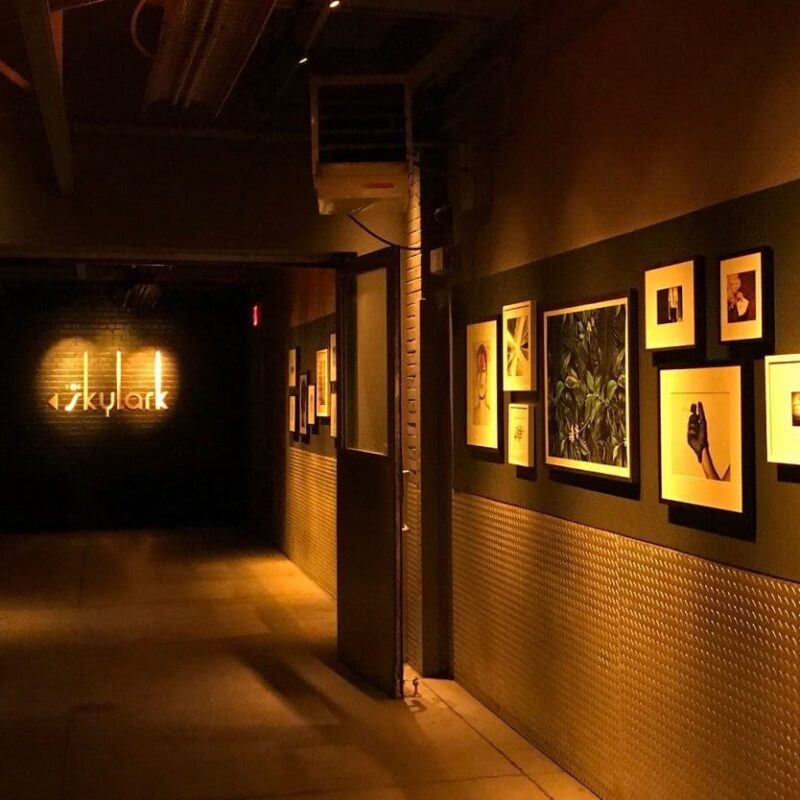 hallway with pictures on the wall