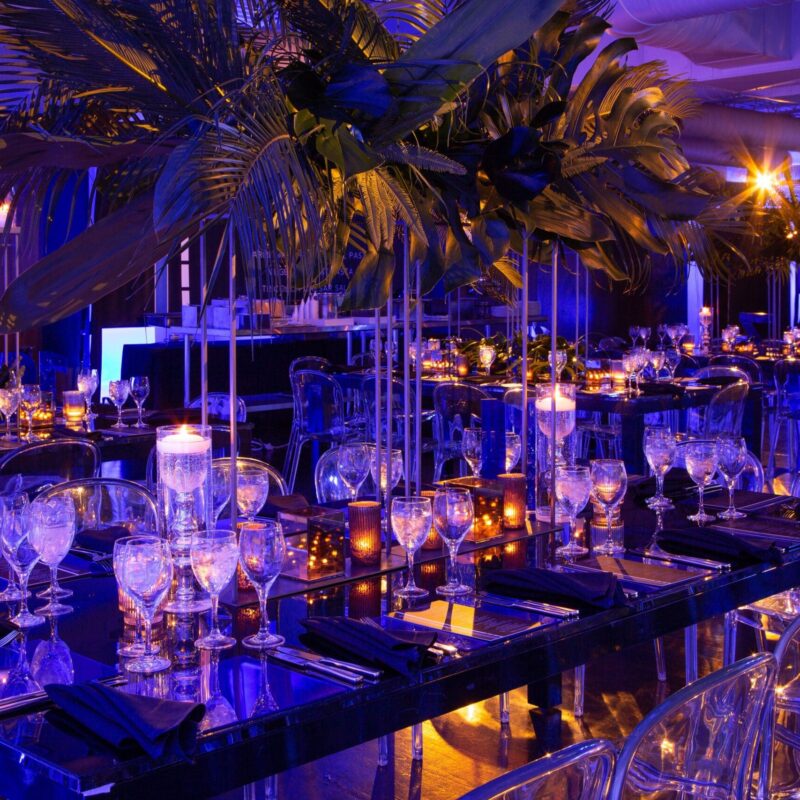 travel themed mitzvah table set up at the loading dock