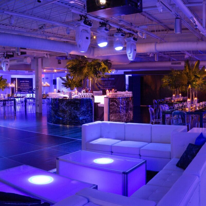 travel themed bar and couch set up at the loading dock