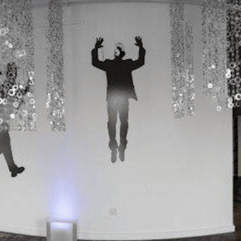 Wall with decals in the shape of humans