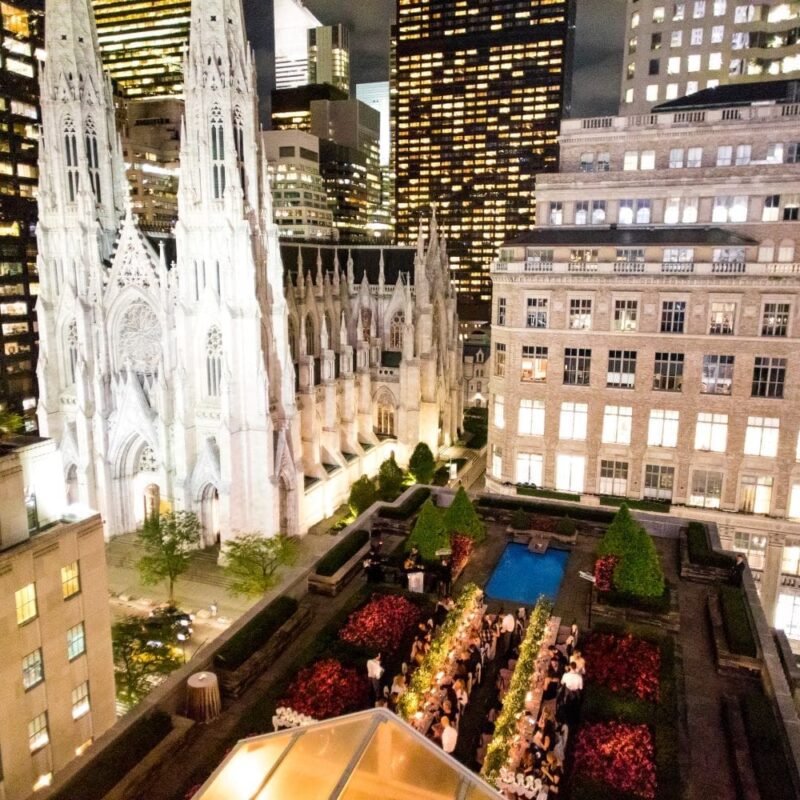 Aerial view of seated dinner set up at 620 Loft & Garden Rooftop